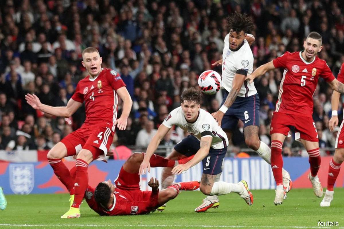 England held 1-1 by Hungary in match marred by crowd violence